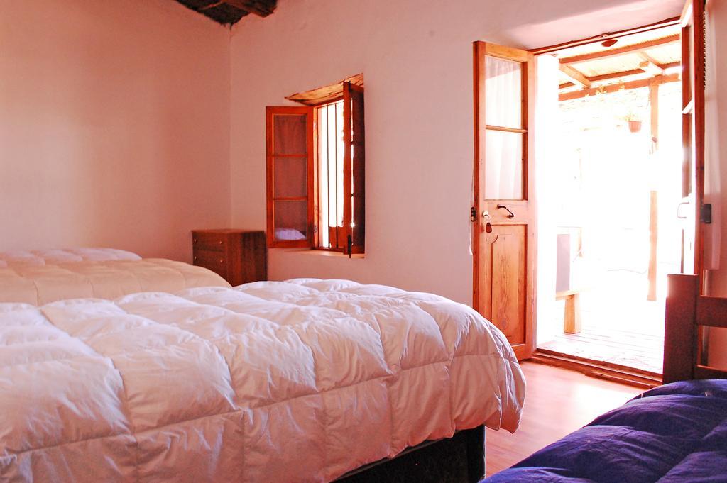 La Casa Del Pueblo Hostal Сан Педро де Атакама Стая снимка